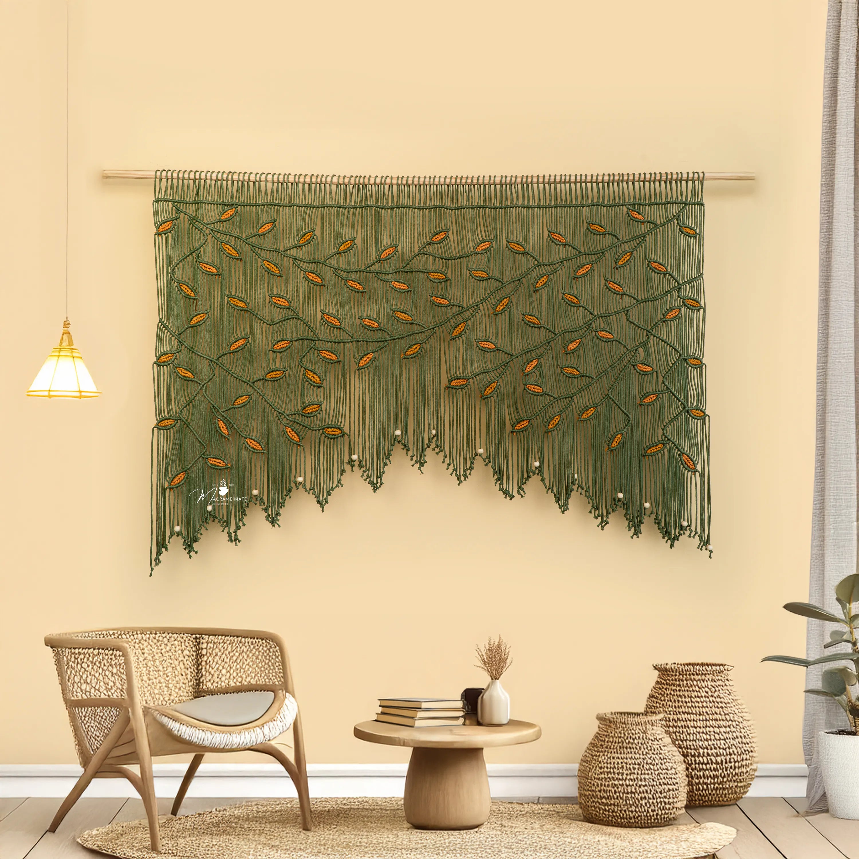 Decorative wall hanging with green leaves in a living room setting.