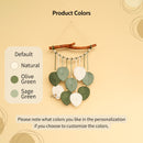 Decorative wall hanging with color swatches on a beige background