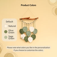 Decorative wall hanging with color swatches on a beige background