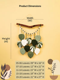 Decorative wall hanging with leaves and measurements on a beige background