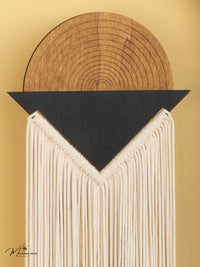 Decorative wall art with wooden texture and geometric design on a gold background