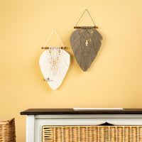 Boho macrame leaf wall art, perfect for adding natural charm    
