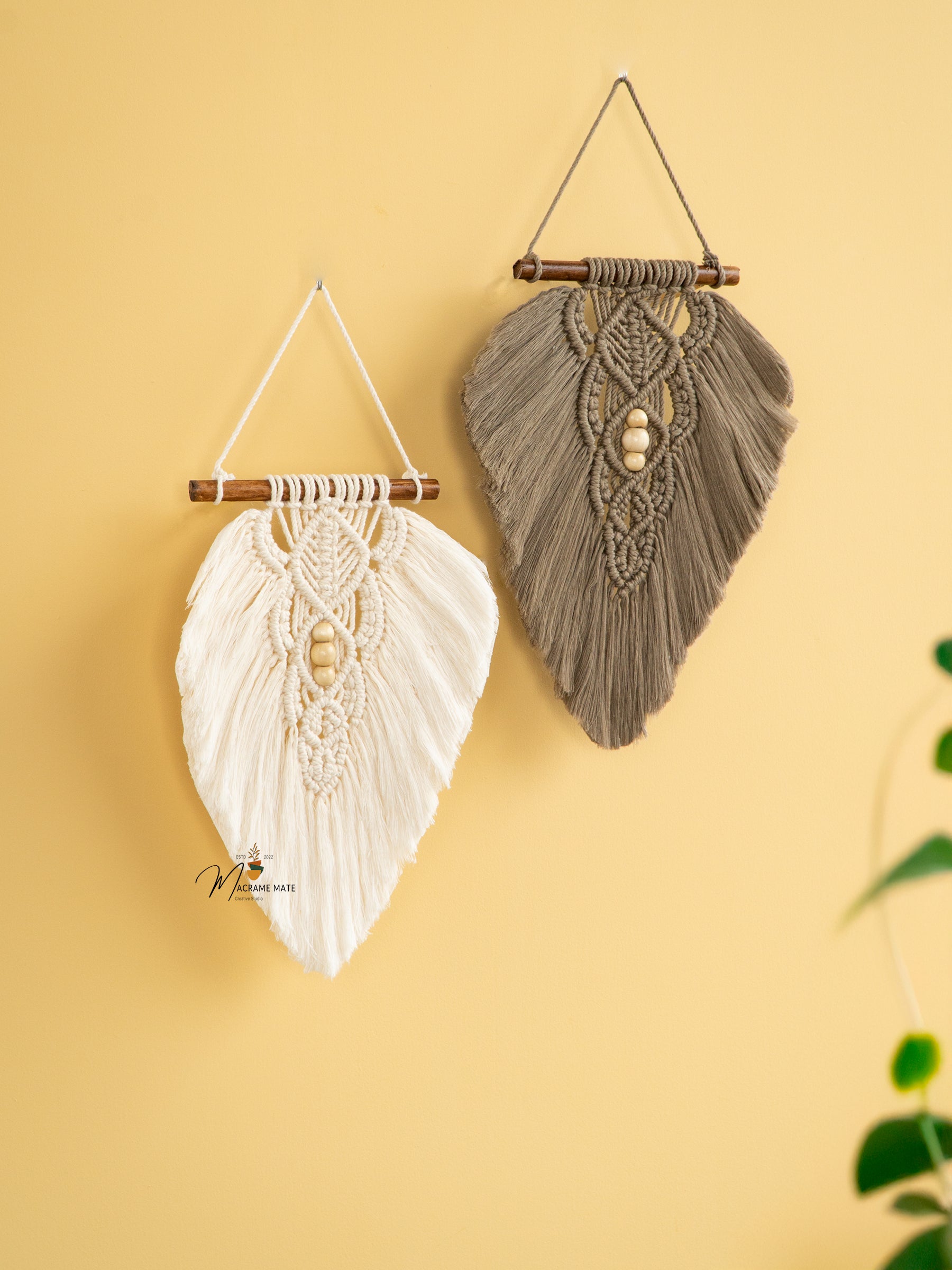 Boho macrame leaf wall decor, ideal for stylish and cozy rooms    
