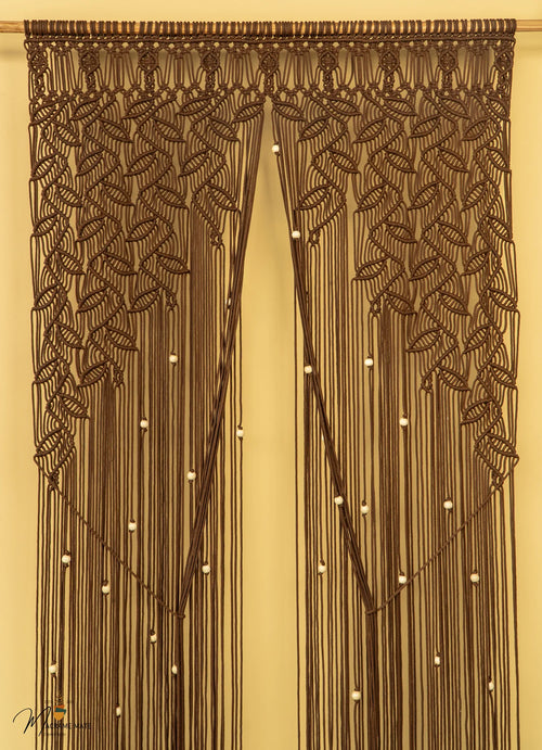 Decorative brown beaded curtain on a beige background
