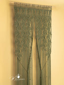 Macrame door curtain with leaf pattern on a beige background, featuring the brand 'Macrame Mate'.