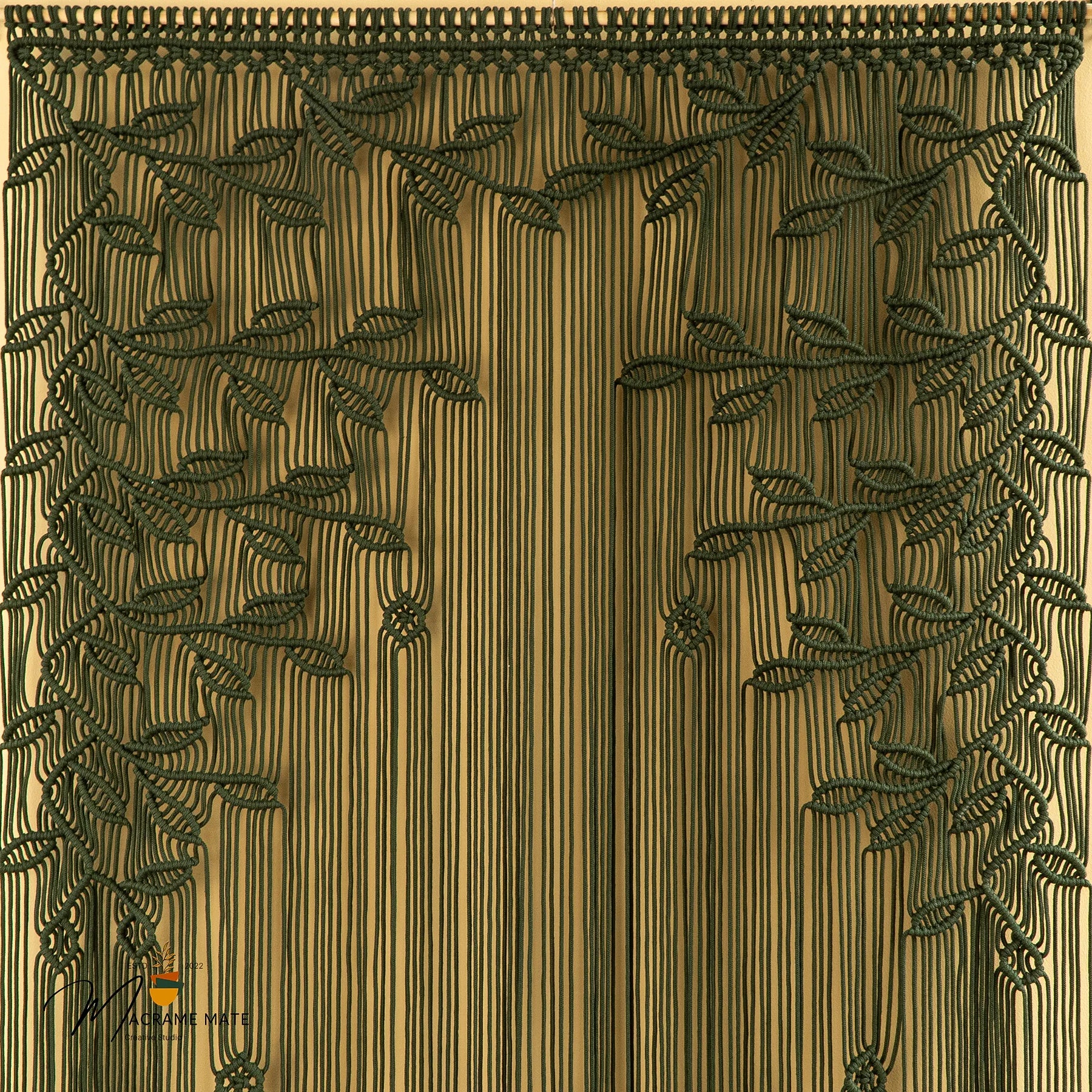 Decorative curtain with leaf pattern on a wooden background