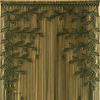 Decorative curtain with leaf pattern on a wooden background
