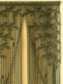 Decorative curtain with intricate leaf pattern on a beige background