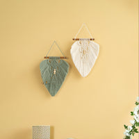 Macrame leaf wall decor, perfect for minimalist or rustic homes    
