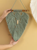 Handcrafted macrame leaf wall art, great for minimalist rooms    
