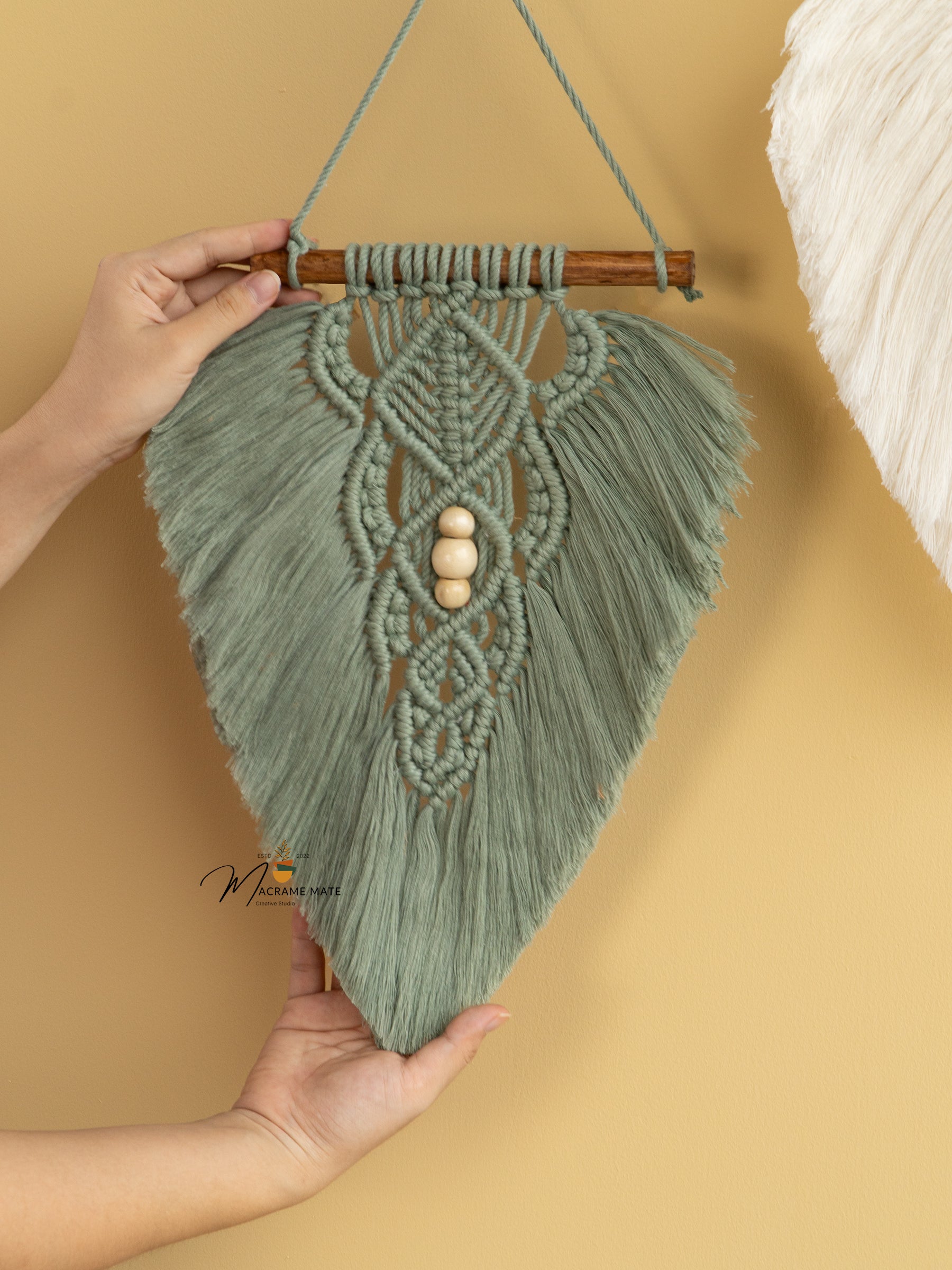 Handcrafted macrame leaf wall art, great for minimalist rooms    
