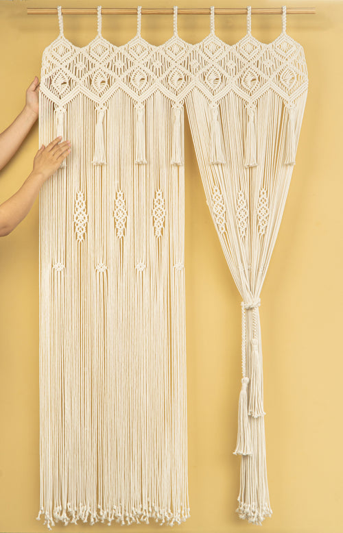Macrame curtain with intricate patterns on a yellow background