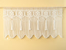 Handcrafted macrame curtain, perfect for minimalist or natural rooms 
