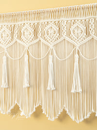 Handcrafted macrame curtain, ideal for modern or rustic spaces 
