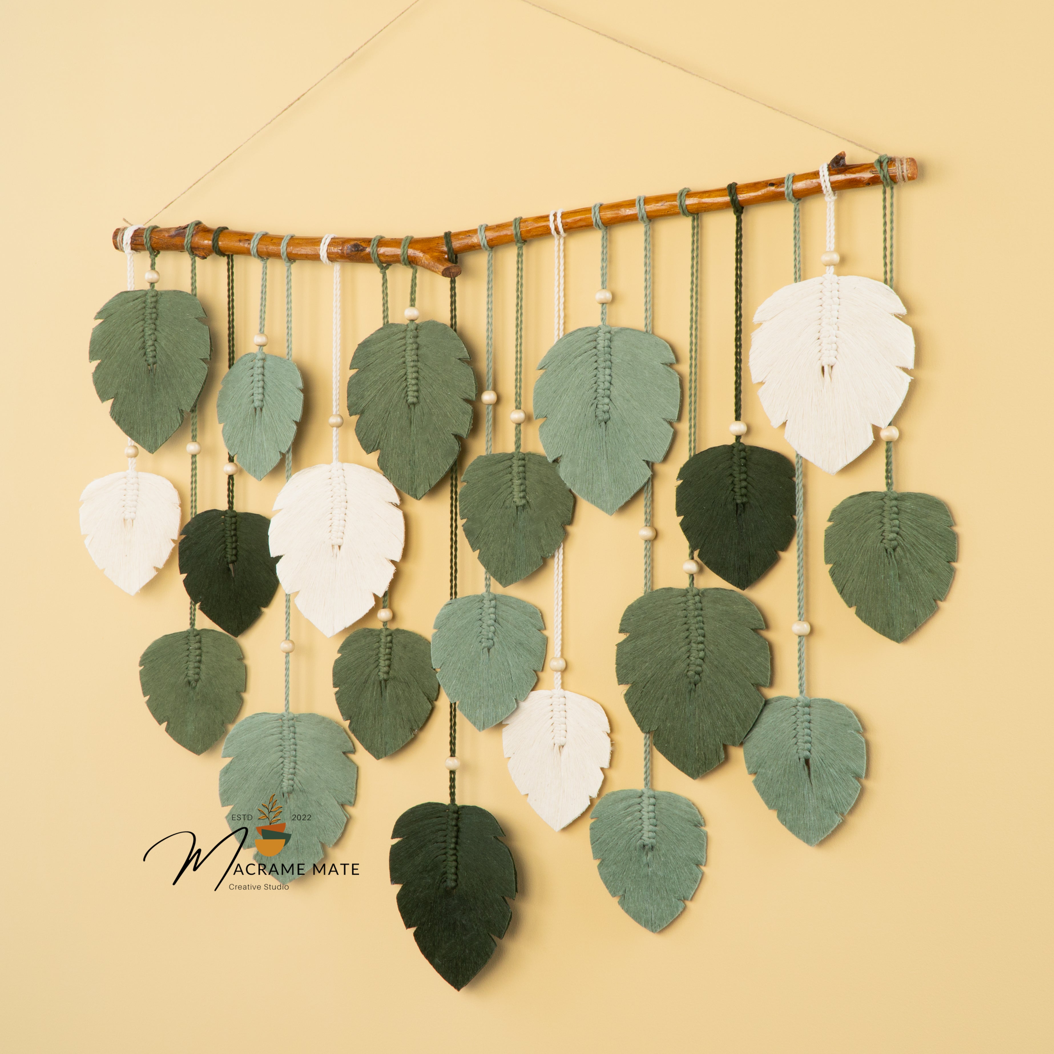 Handwoven macrame leaf, ideal for rustic or modern walls    
