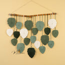 Boho macrame leaf wall hanging, great for cozy or earthy decor    
