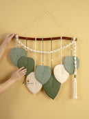 Handcrafted macrame leaf art, perfect for natural or boho decor    
