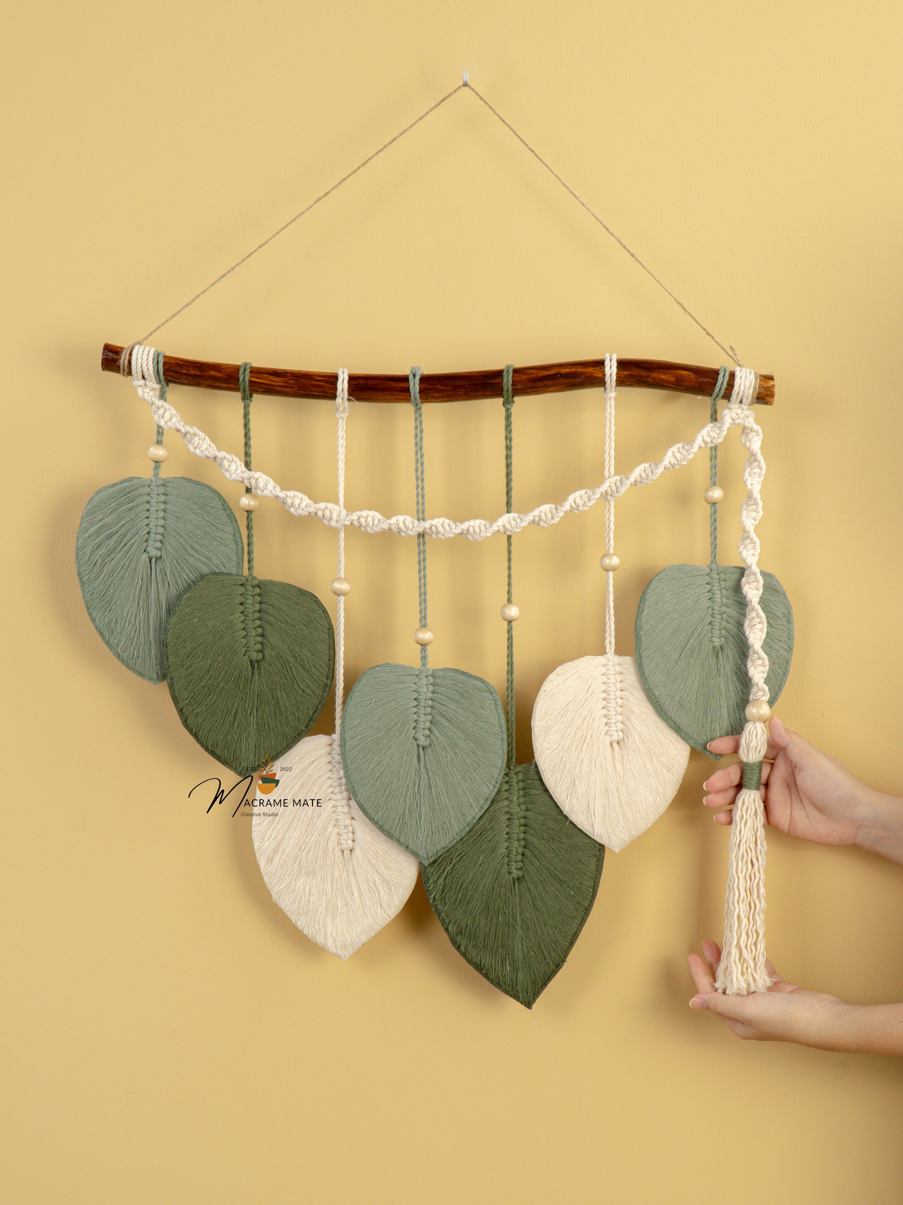 Macrame leaf wall hanging, ideal for boho or earthy decor    
