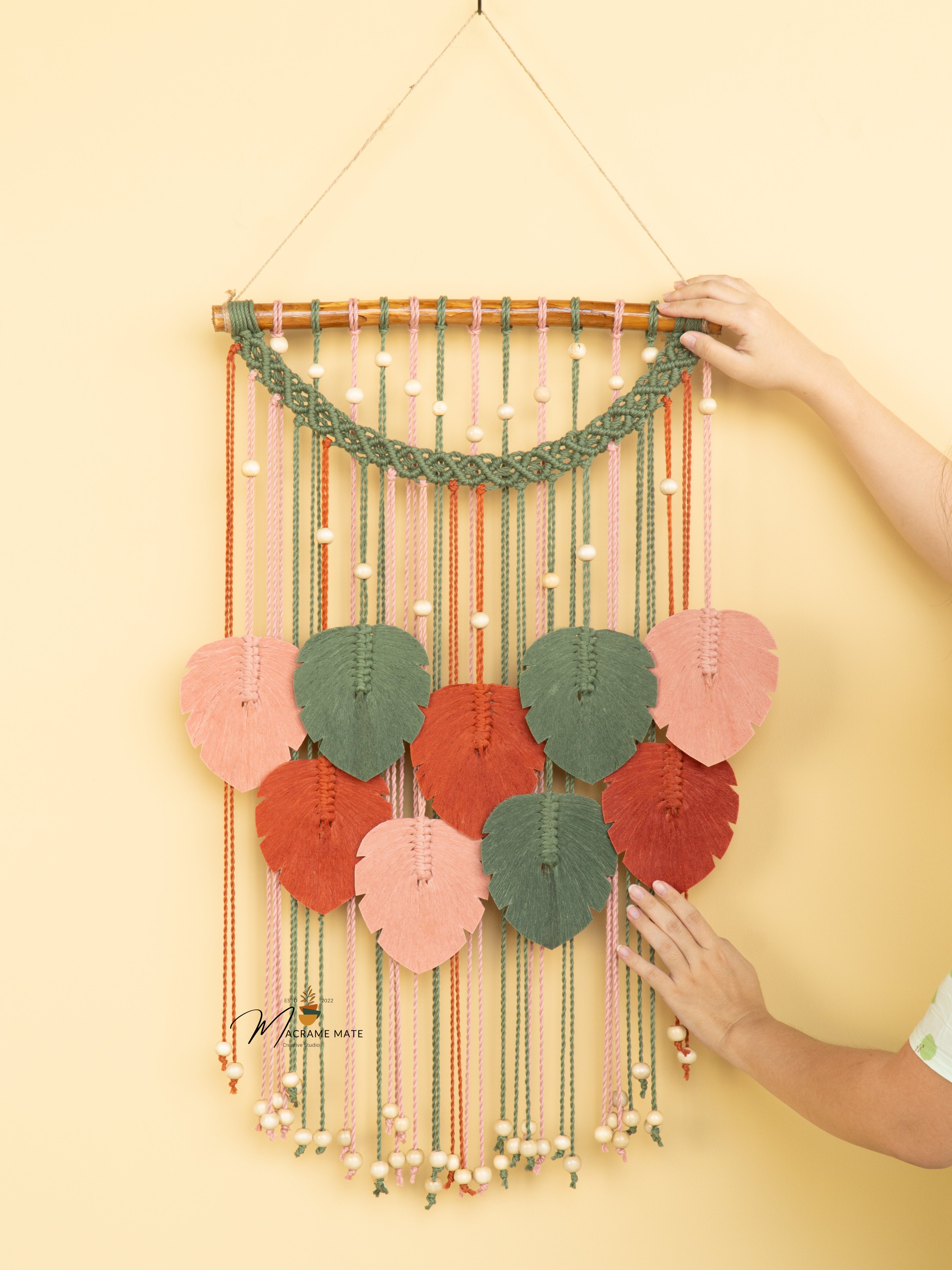Handcrafted macrame leaf art, ideal for natural or simple spaces    
