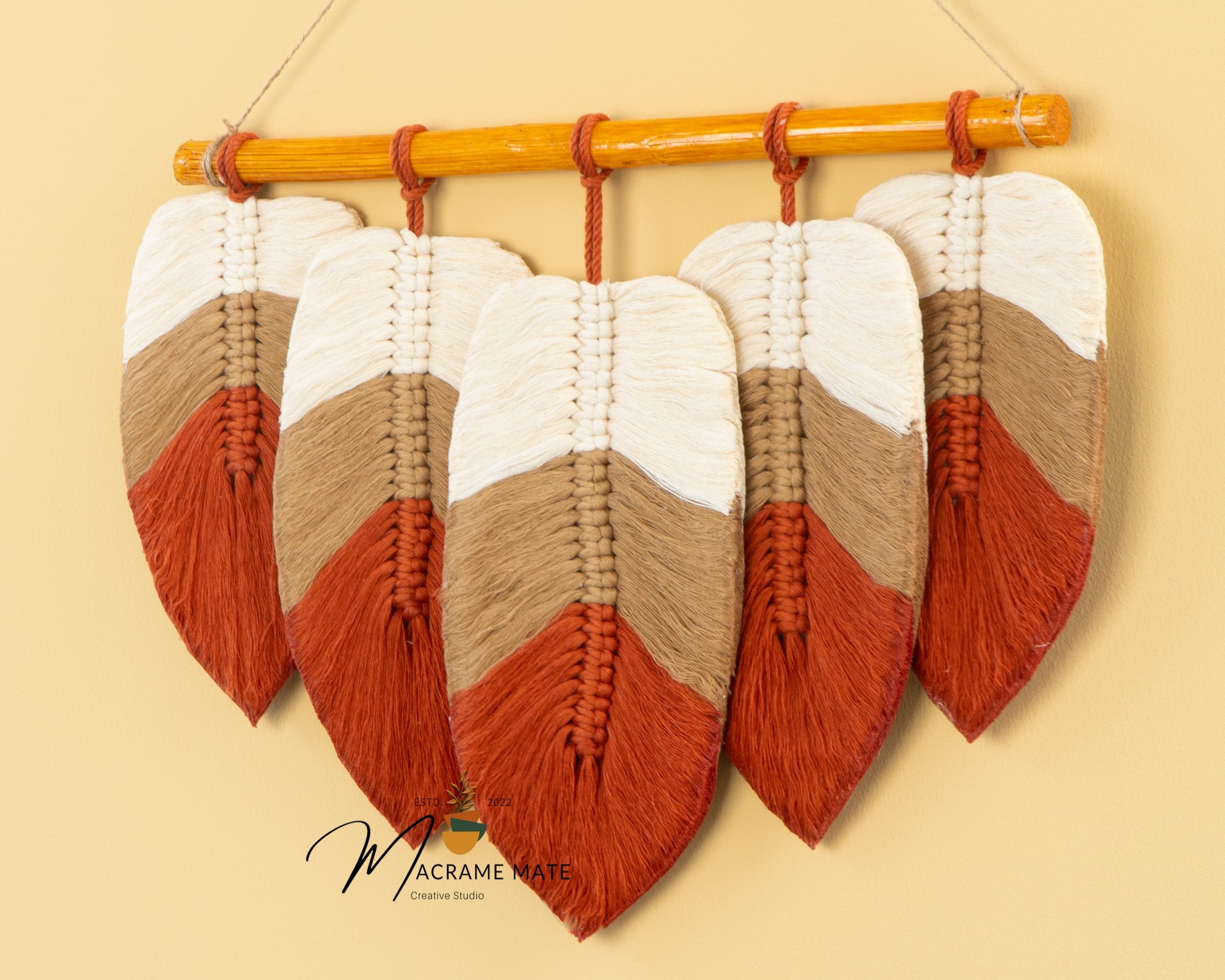 Macrame leaf decor, ideal for minimalist or boho-inspired spaces    
