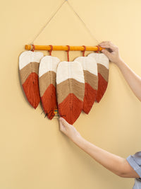 Macrame leaf wall hanging, ideal for boho or earthy decor    
