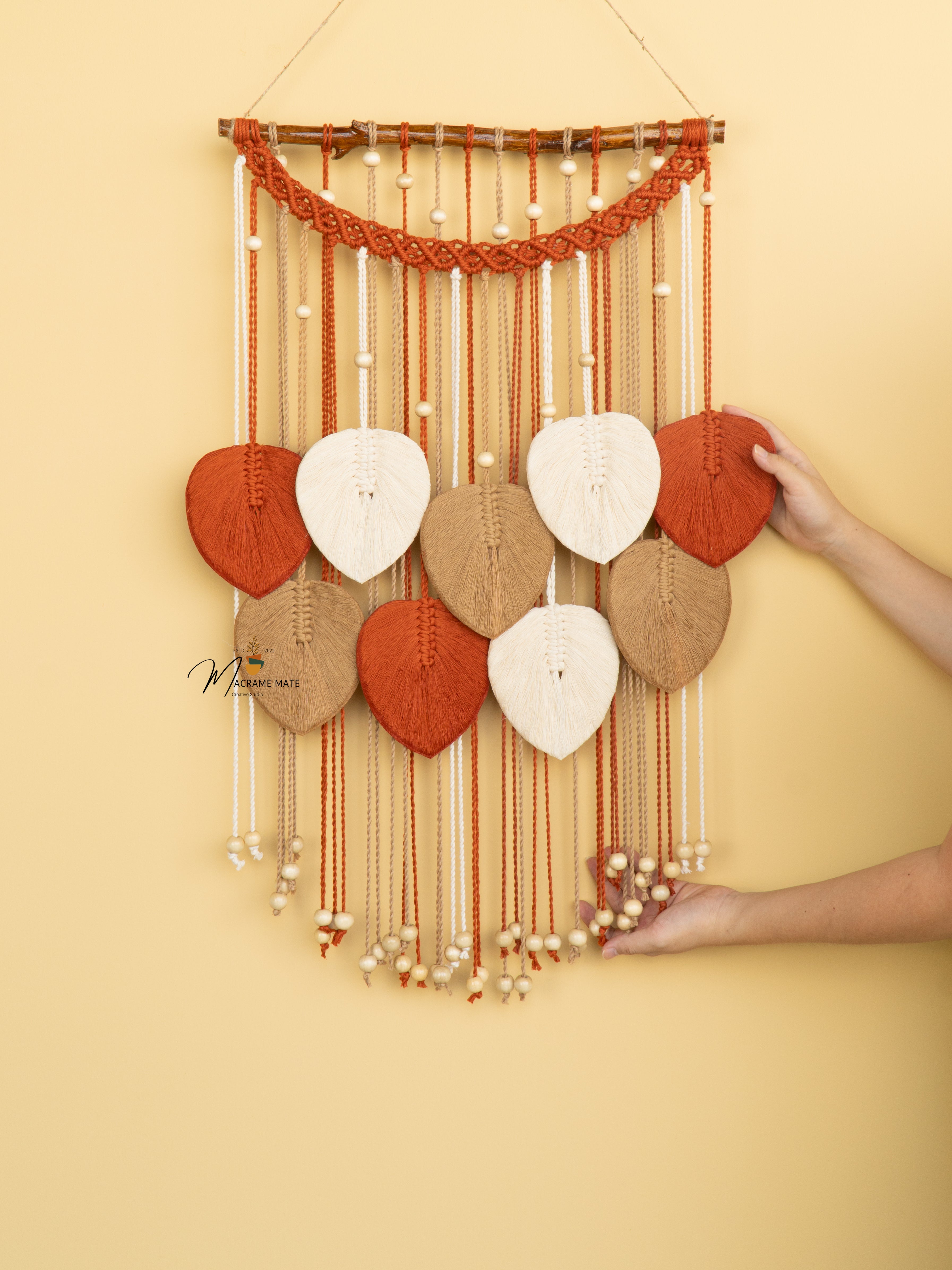 Boho macrame leaf wall hanging, perfect for cozy home decor    
