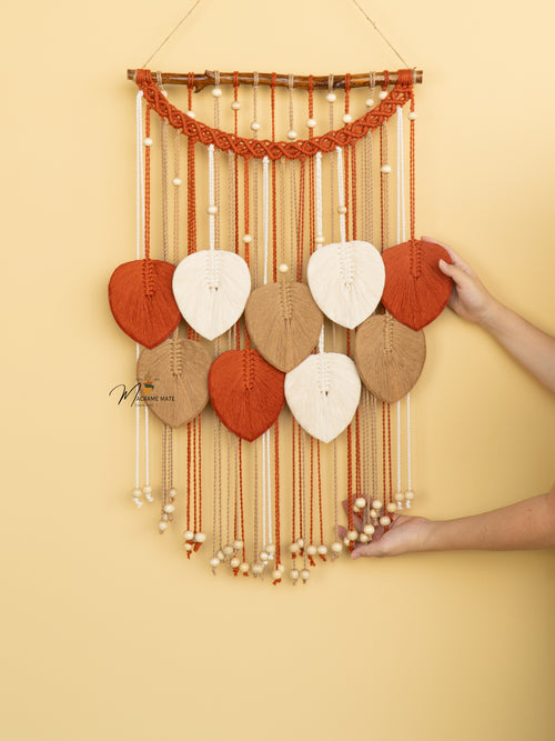 Boho macrame leaf wall hanging, perfect for cozy home decor    
