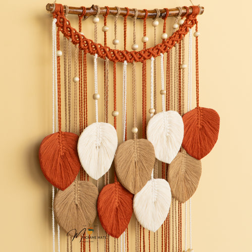 Macrame leaf wall hanging, ideal for boho or earthy decor    
