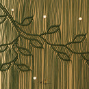 A close-up of a textured wall or wallpaper featuring a dark green rope-style leaf and vine pattern over a warm tan background with vertical ribbed lines and small white bead accents.