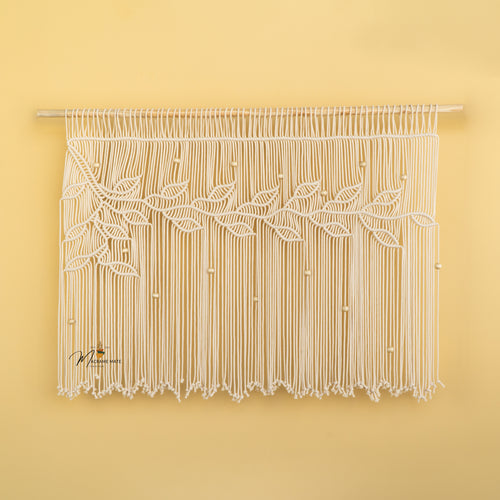 Natural macrame curtain, great for minimalist homes 
