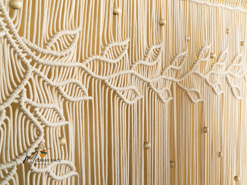Handwoven macrame curtain, perfect for adding natural charm 
