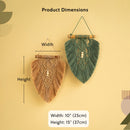 Product dimensions diagram showing two woven wall hanging macrame wall decor pieces in natural tan and sage green, with labeled width and height measurements on a warm beige background.