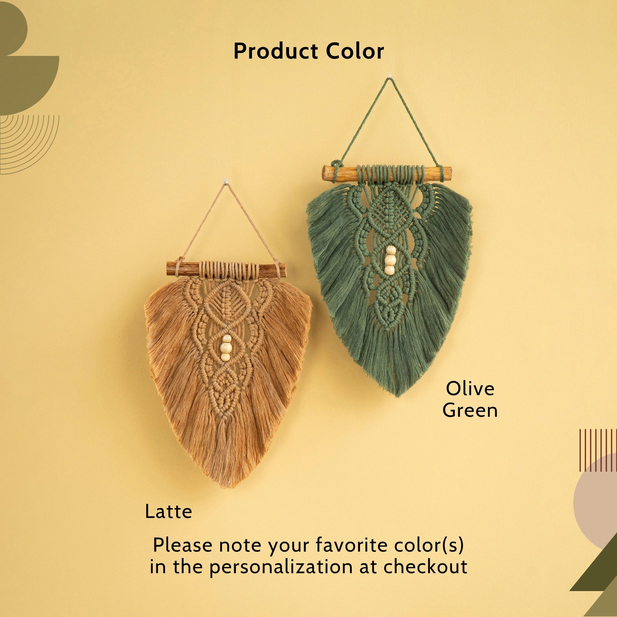 Two woven wall hanging macrame leaf-shaped ornaments on a warm beige background. One is labeled 'Latte' in natural tan and the other 'Olive Green' in muted green, both with wooden dowels, string hangers, and small pearl-like beads at the center.