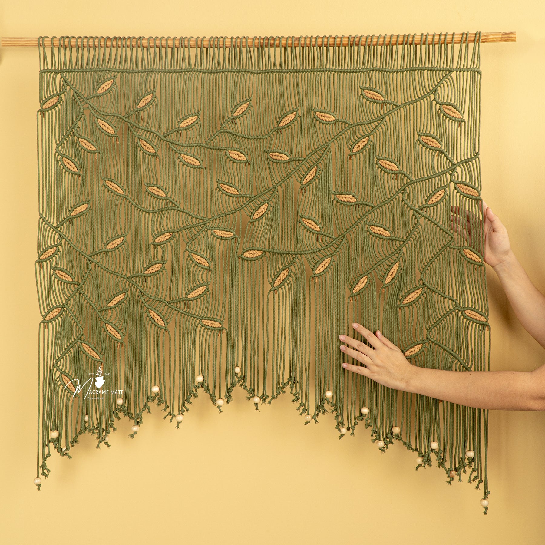 Boho macrame curtain, ideal for earthy or minimalist decor 
