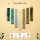 Product dimensions chart showing six macrame wall hangings in different colors (black, teal, light blue, cream, sage green, and dark olive) with labeled height and width measurements, plus a size reference table at the bottom on a beige background.