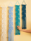 Four macrame wall hangings in different colors on a yellow background