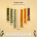 Product color options chart showing six woven macrame wall hangings in different colors: Dark Green, Olive Green, Sage Green, Natural, Orange, and Brown, with text stating 'Product Color (Available 25 color options)'.