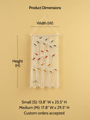 Macrame wall hanging with dimensions labeled on a beige background