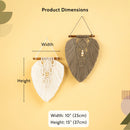 Product dimensions diagram showing two woven wall hangings on a warm beige background. One is white and one is taupe-gray, both with wooden dowels and hanging cords.